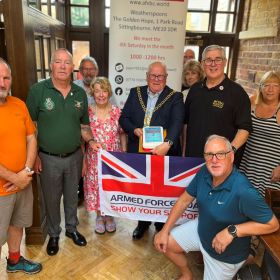 The Mayor and Mayoress celebrating Armed Forces day with members of the Armed Forces Breakfast Club. 